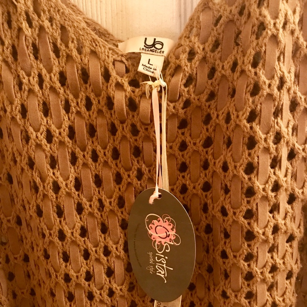 Sleeveless sweater top